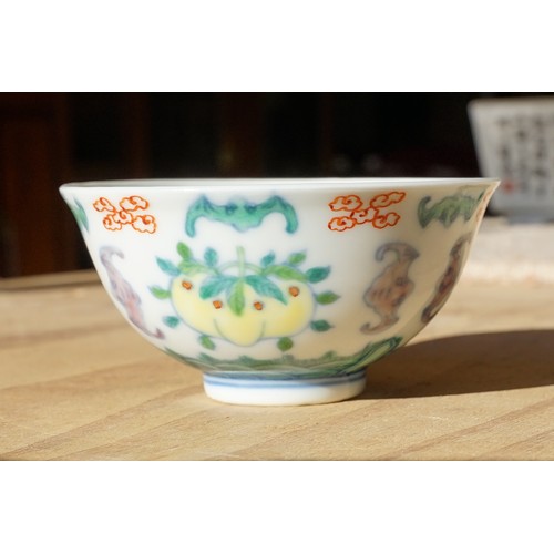 2 - Pair of 19th Century Chinese tea bowls to include a footed cup decorated with florals with a six cha... 