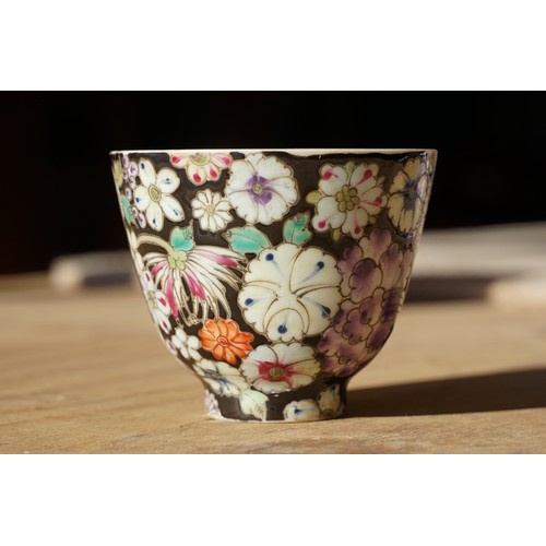 5 - Pair of 19th Century hand enamelled Chinese tea bowls, decorated with florals on a black ground. Bot... 