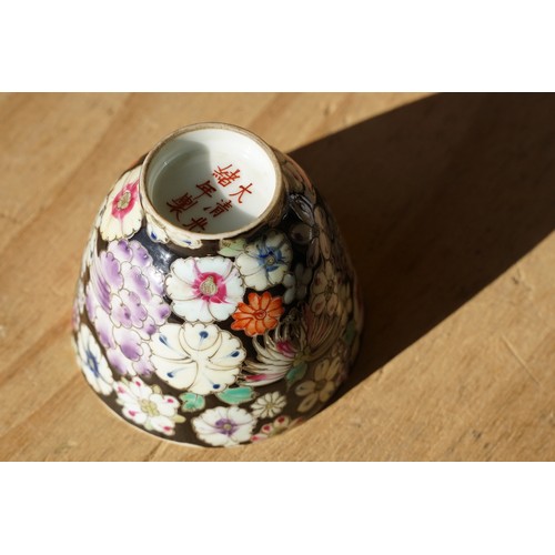 5 - Pair of 19th Century hand enamelled Chinese tea bowls, decorated with florals on a black ground. Bot... 