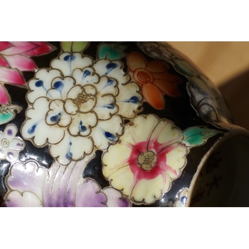 5 - Pair of 19th Century hand enamelled Chinese tea bowls, decorated with florals on a black ground. Bot... 