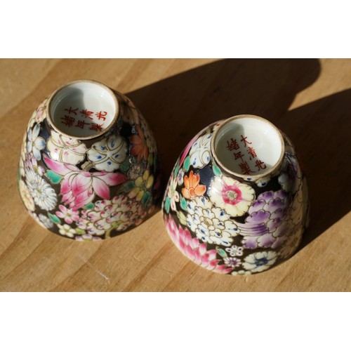 5 - Pair of 19th Century hand enamelled Chinese tea bowls, decorated with florals on a black ground. Bot... 