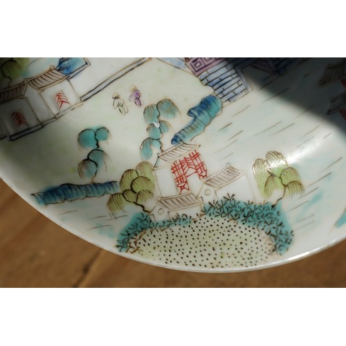 10 - Pair of 19th Century Chinese round dishes being hand enamelled with pagoda and garden scenes. Both w... 