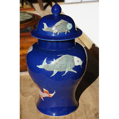 34 - Kangxi period powder blue lidded vase with carp fish pattern, baluster form with flared foot and str... 