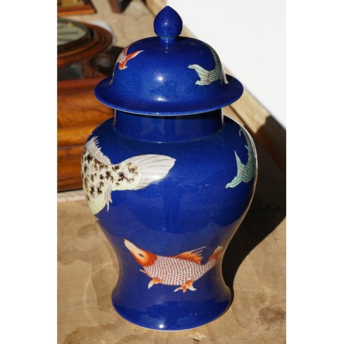 34 - Kangxi period powder blue lidded vase with carp fish pattern, baluster form with flared foot and str... 