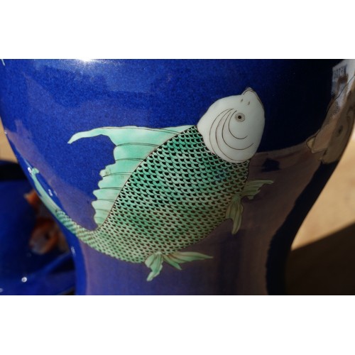 34 - Kangxi period powder blue lidded vase with carp fish pattern, baluster form with flared foot and str... 