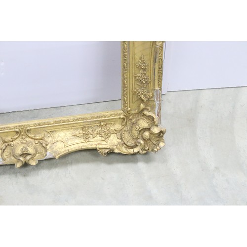 691A - Late 19th / Early 20th Century gilt picture frame with ornately moulded border, measures 67cm x 56cm... 