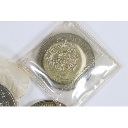 236 - A small collection of British commemorative coins together with two silver Maria Theresa thaler coin... 