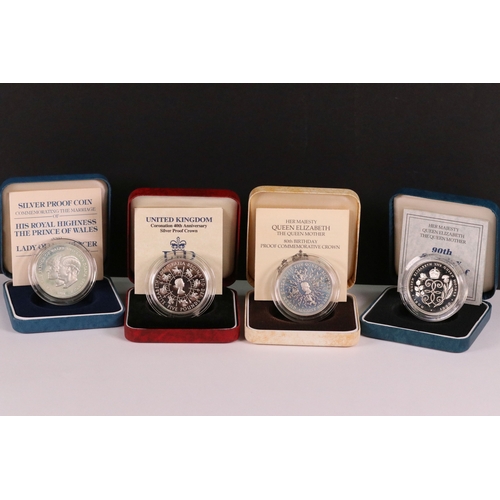 210 - A collection of four Royal Mint United Kingdom silver proof commemorative crown coins to include the... 