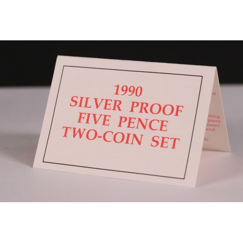 211 - A collection of three Royal Mint United Kingdom silver proof two coin sets to include 1990 five penc... 