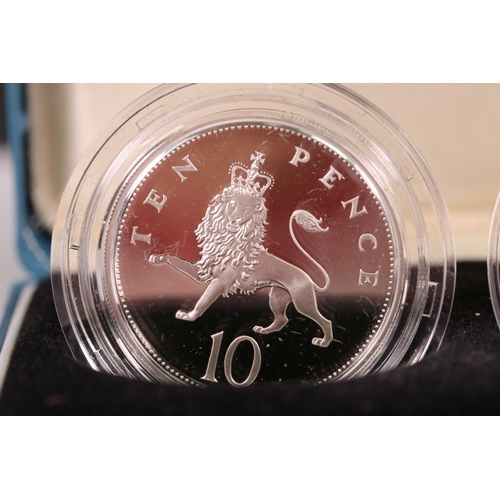 211 - A collection of three Royal Mint United Kingdom silver proof two coin sets to include 1990 five penc... 