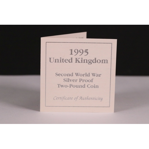 212 - A collection of three Royal Mint United Kingdom silver proof coins to include the 1995 second world ... 