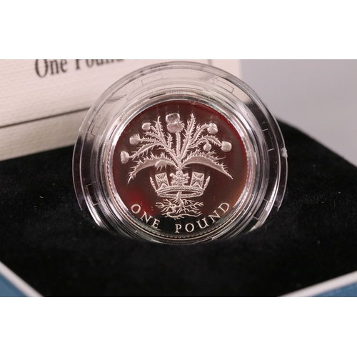 212 - A collection of three Royal Mint United Kingdom silver proof coins to include the 1995 second world ... 