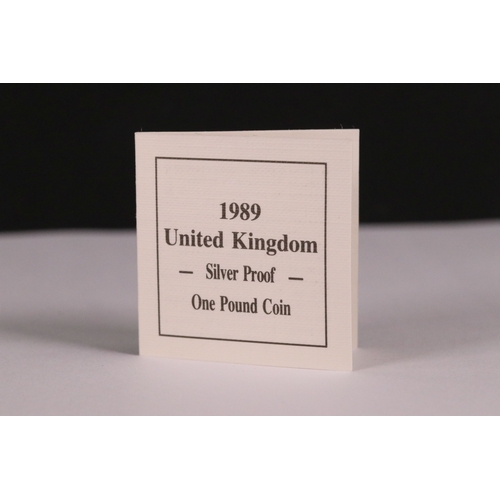 212 - A collection of three Royal Mint United Kingdom silver proof coins to include the 1995 second world ... 