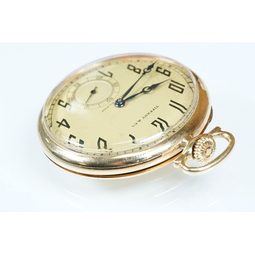 386A - Tiffany & Co 18ct gold Art Deco open face pocket watch having a gilt face with arabic numerals to th... 