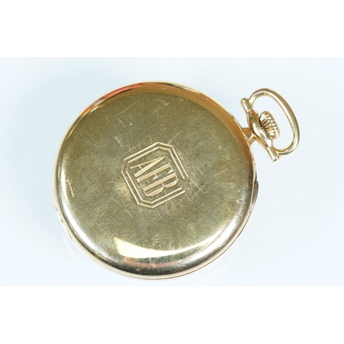 386A - Tiffany & Co 18ct gold Art Deco open face pocket watch having a gilt face with arabic numerals to th... 