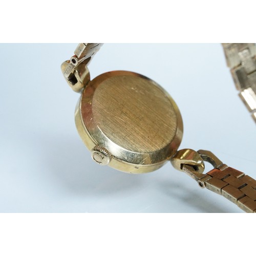 393 - Ladies Omega dress watch having a round face with gilt dial and baton markers to the chapter ring wi... 