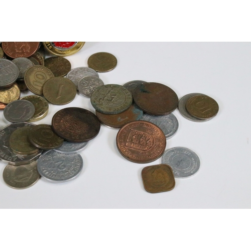 307 - A collection of British pre decimal and world coins to include a small quantity of silver and a quan... 