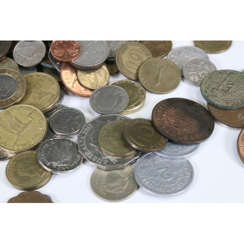 307 - A collection of British pre decimal and world coins to include a small quantity of silver and a quan... 