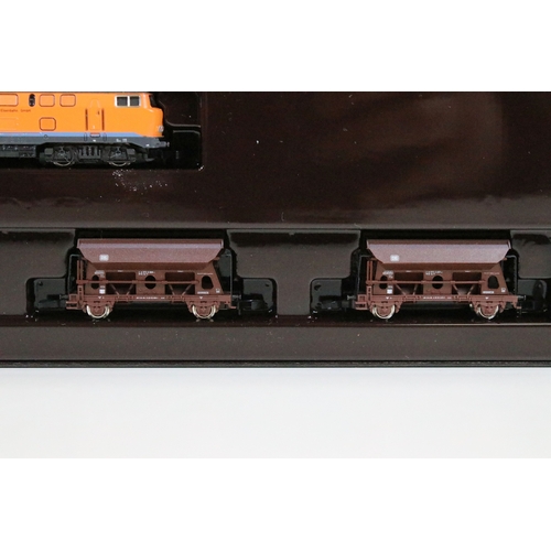 27 - Two boxed Marklin Mini Club Z gauge train packs including 81411 Hopper Wagon Train Pack and 86552 DB... 