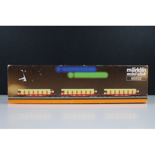 27 - Two boxed Marklin Mini Club Z gauge train packs including 81411 Hopper Wagon Train Pack and 86552 DB... 