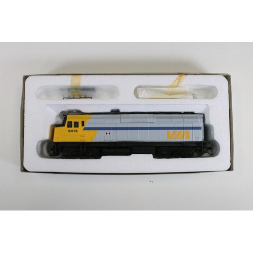 46 - Six boxed HO gauge locomotives to include 2 x Tramline 931-308 EMD F40PH Via Rail, 2 x Proto 1000 Se... 