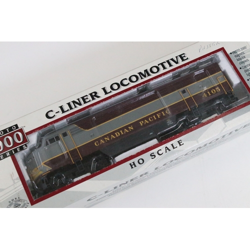 46 - Six boxed HO gauge locomotives to include 2 x Tramline 931-308 EMD F40PH Via Rail, 2 x Proto 1000 Se... 