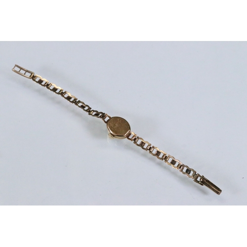 386 - 9ct gold Hefik 9ct gold wrist watch having a round face with arabic numerals to the chapter ring wit... 