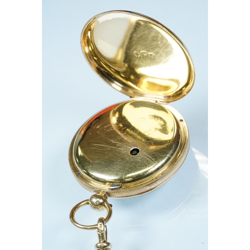 387 - 18ct gold open face pocket watch and curb link pocket watch chain. Pocket watch having a white ename... 