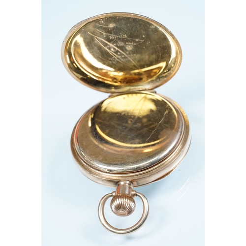 388 - Record gold plated pocket watch having a white dial with arabic numerals to the chapter ring and sub... 