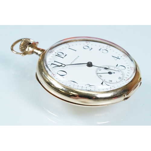 392A - Waltham USA gold plated open face pocket watch having a white enamelled face with arabic numerals to... 