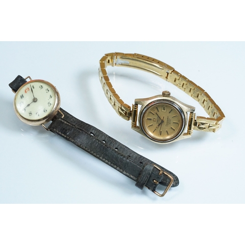 394 - Omega Seamaster Cosmic 2000 wrist watch having a round face with a gilt face with baton markers to t... 