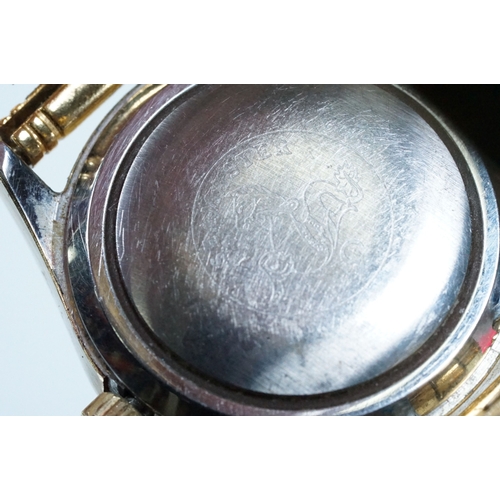 394 - Omega Seamaster Cosmic 2000 wrist watch having a round face with a gilt face with baton markers to t... 