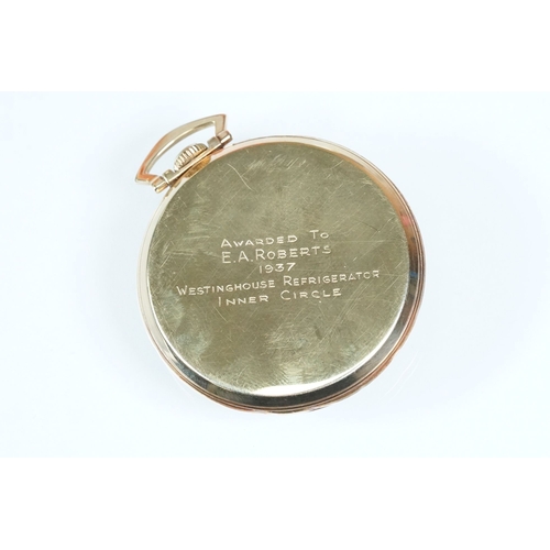 394A - Art Deco Longines 14ct gold open face pocket watch having arabic numerals to the chapter ring with s... 