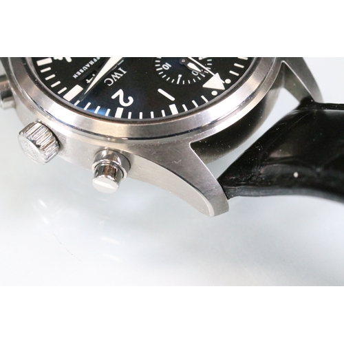 396 - IWC chronograph pilots watch having a round face with black dial, with which arabic numerals to the ... 