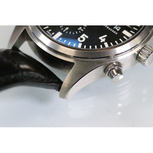 396 - IWC chronograph pilots watch having a round face with black dial, with which arabic numerals to the ... 