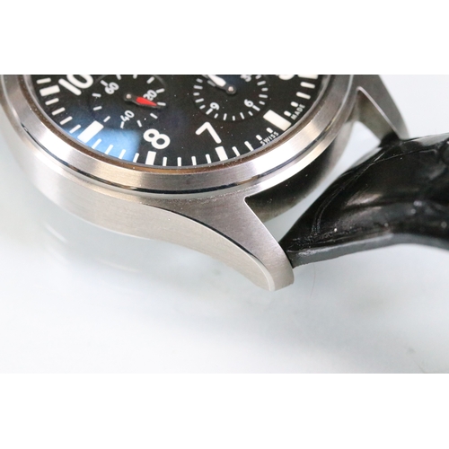 396 - IWC chronograph pilots watch having a round face with black dial, with which arabic numerals to the ... 