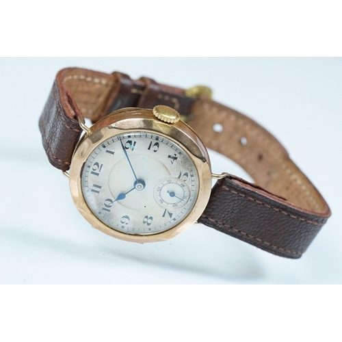 433 - 1920s 9ct gold wrist watch having arabic numerals to the chapter ring and subsidiary dial to six. Im... 