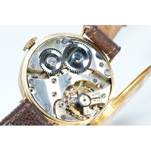 433 - 1920s 9ct gold wrist watch having arabic numerals to the chapter ring and subsidiary dial to six. Im... 