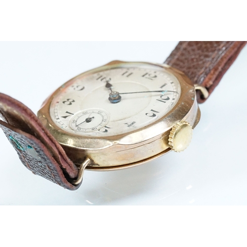 433 - 1920s 9ct gold wrist watch having arabic numerals to the chapter ring and subsidiary dial to six. Im... 