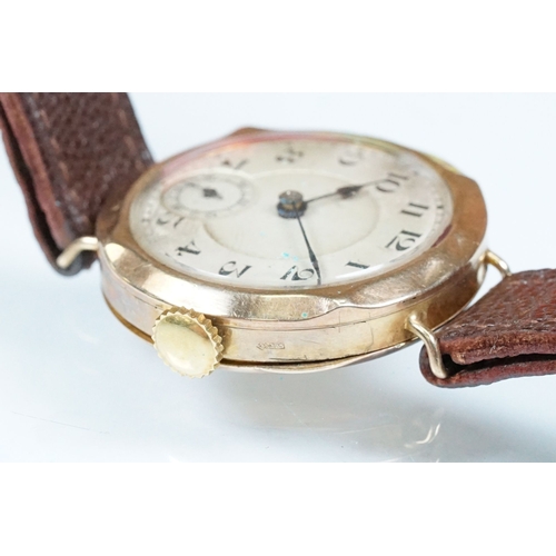 433 - 1920s 9ct gold wrist watch having arabic numerals to the chapter ring and subsidiary dial to six. Im... 