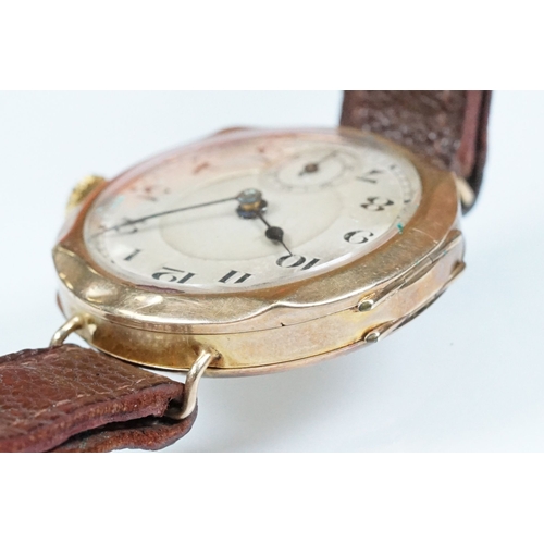 433 - 1920s 9ct gold wrist watch having arabic numerals to the chapter ring and subsidiary dial to six. Im... 