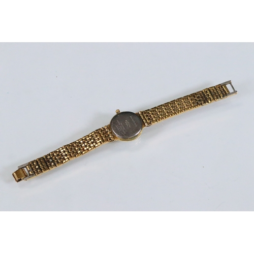 434 - Rotary ladies wrist watch having a round face with baton markers to the chapter ring on a bracelet s... 