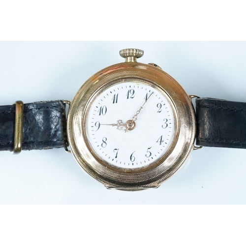 435 - 14ct gold 1920s wrist watch having a white enamelled dial with arabic numerals to the chapter ring a... 