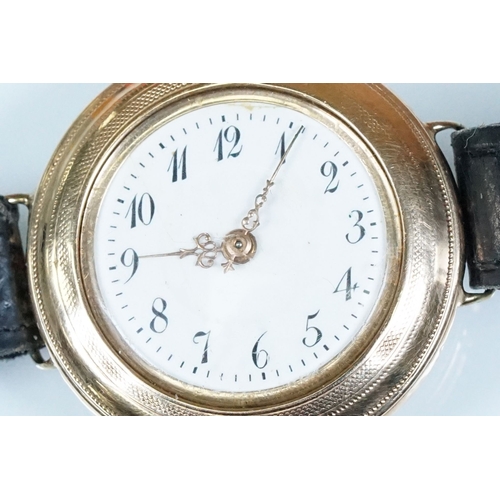 435 - 14ct gold 1920s wrist watch having a white enamelled dial with arabic numerals to the chapter ring a... 