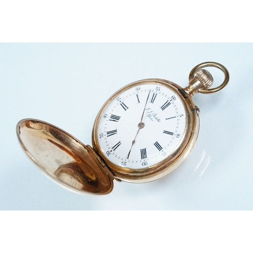 437 - 14ct gold full hunter fob watch having an engine turned case with white enamel dial, roman numerals ... 