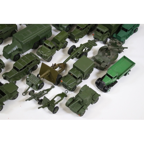 1272 - Around 35 Mid 20th C onwards military diecast models to include Dinky, Britains, etc featuring boxed... 