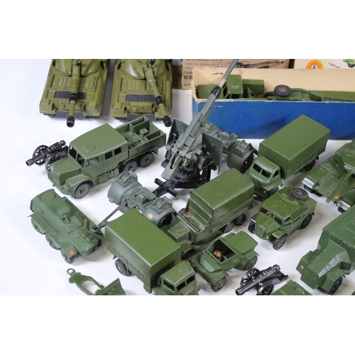 1272 - Around 35 Mid 20th C onwards military diecast models to include Dinky, Britains, etc featuring boxed... 