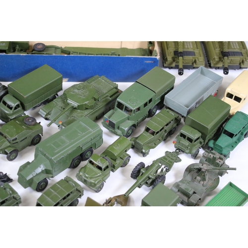 1272 - Around 35 Mid 20th C onwards military diecast models to include Dinky, Britains, etc featuring boxed... 