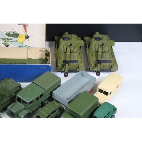1272 - Around 35 Mid 20th C onwards military diecast models to include Dinky, Britains, etc featuring boxed... 