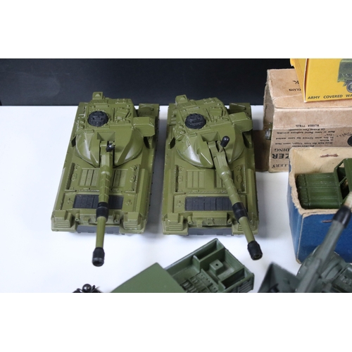 1272 - Around 35 Mid 20th C onwards military diecast models to include Dinky, Britains, etc featuring boxed... 